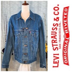Levi Strauss & Co blue “Trucker” denim jacket.